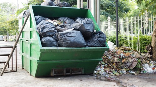 Workers segregating construction waste